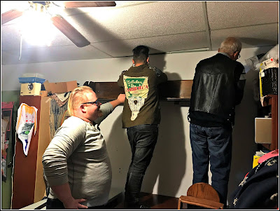 April 11, 2019 Watching the hanging of shelves in my craft-room. 