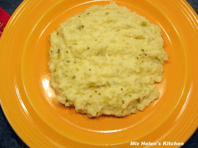 Tomatillo Cheese Grits at Miz Helen's Country Cottage