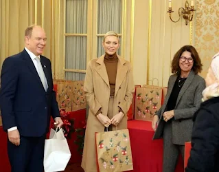 Prince Albert II and Princess Charlene of Monaco Christmas gift distribution