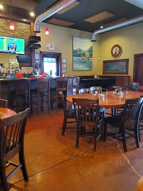 Dining area and bar inside Bentino's Pizza in Jamestown, Ohio