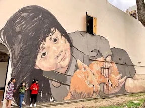 Girl with Lion Cub painting at Victoria Street