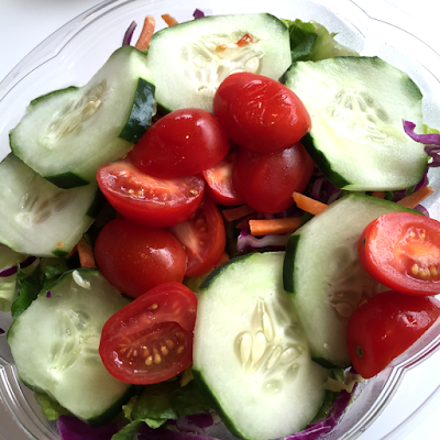 Fresh and vibrant salad at Nic's Organic Fast Food.