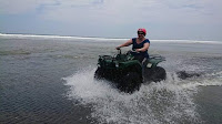 Ride a Atv on the beach 