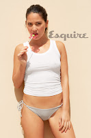 Olivia Munn hot in bikini panties and licking a cany cane