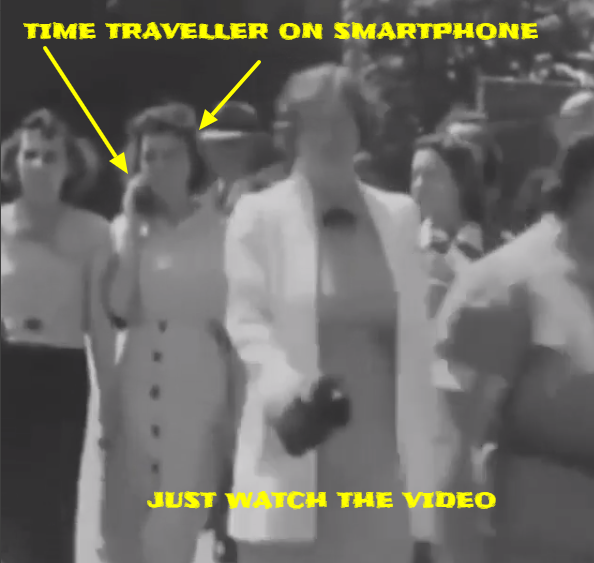 Woman time traveller caught talking in to a cell phone in an old black and white film.