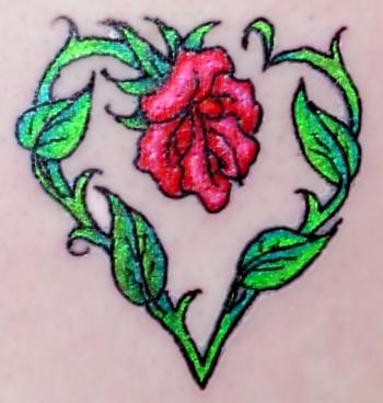 lower back rose tattoos. The first of my rose tattoos