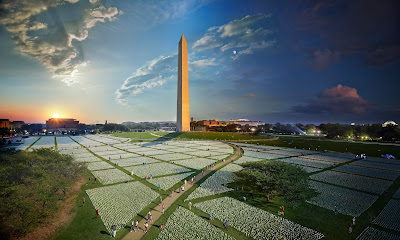 color composite photograph of "In America Remember" installation of white flags at Washington DC Mall