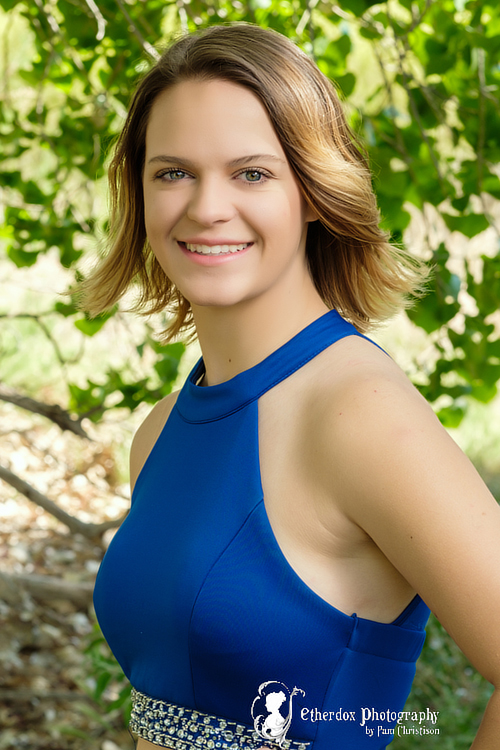 Professional portrait of a beautiful high school senior outdoors location Albuquerque