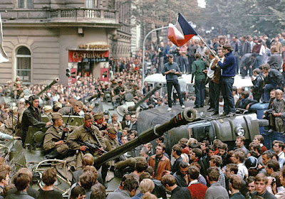 Prague residents surround Soviet tanks in front of the Czechoslovak Radio building, in central Prague, during the first day of the Soviet-led invasion of Czechoslovakia, on August 21, 1968.