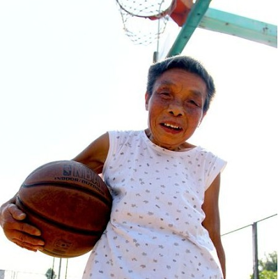 basketball-playing grandmother. Zhu Shumei, 76, has been playing basketball every day for the past 20 years. On an average day on a university campus in eastern China, a woman runs through her usual exercise routine. Playing basketball well requires a certain level of skill, hand-eye coordination, and athleticism. Even at 76, great-grandmother Zhu Shumei is far from being a basket case when it comes to keeping fit. 76-year-old Chinese woman Zhu Shumei has gained fame after student posted video of her daily life online. A 76-year-old woman who lives with her daughter . Meet Zhu Shumei - or as the some people call her, the Basketball Grandma. This 76 year old grandmother is slowly taking the internet by storm. Chinese woman has shot to fame with her basketball skills. Zhu Shumei from China's eastern Zhejiang province. Zhu Shumei from China makes over 200 baskets each day. Basketball granny inspires Chinese students. Zhu Shumei, 76, has captured Chinese net users' hearts lately. Standing only 150 cm tall (5 ft.), the hunchbacked granny plays basketball. 