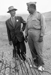 Oppenheimer and General Groves at the Trinity test site.