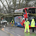 Killer Storm Erik strikes Britain: Terrifying moment planes battle 80mph gales to land at Heathrow - as driver dies after tree lands on car and five bus passengers escape death when trunk crashes through top-deck (35 Pics)