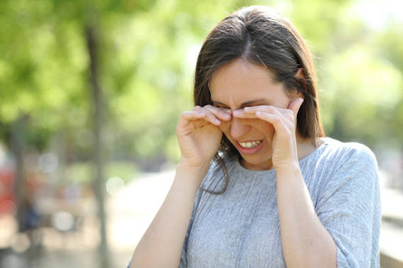 Lady with eye irritation