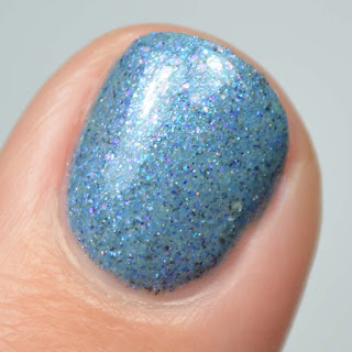 blue nail polish macro