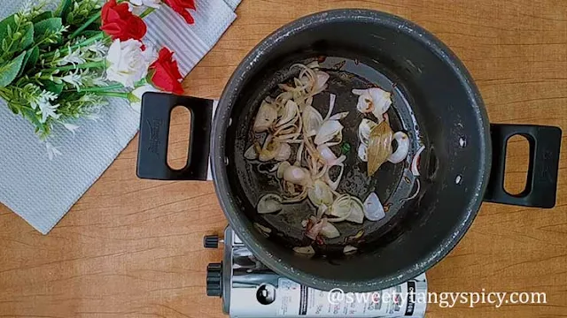 Golden brown onions with ginger-garlic paste and green chilies