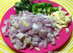 onion,garlic,green chili and curry leaves