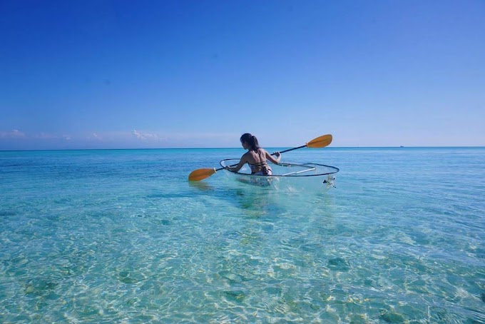 Pedalling Transparent Boat In Mantanani