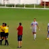 Brazilian soccer referee pulls a gun on the pitch after row over red card