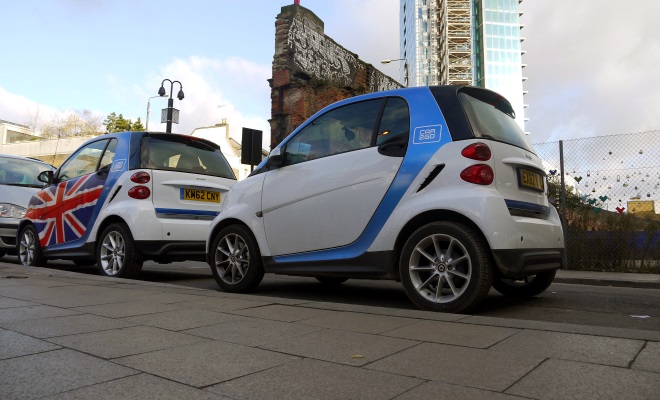 A pair of Car2go Smart cars