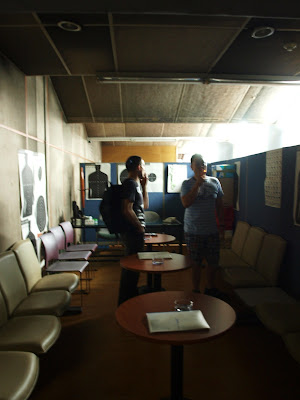 smoking guns shooting gallery. Shady smoking lounge at