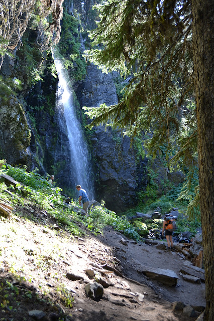 Strawberry Falls with a few hikers nearby