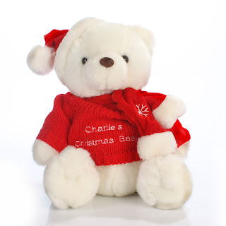 White Christmas teddy bear with Santa hat picture