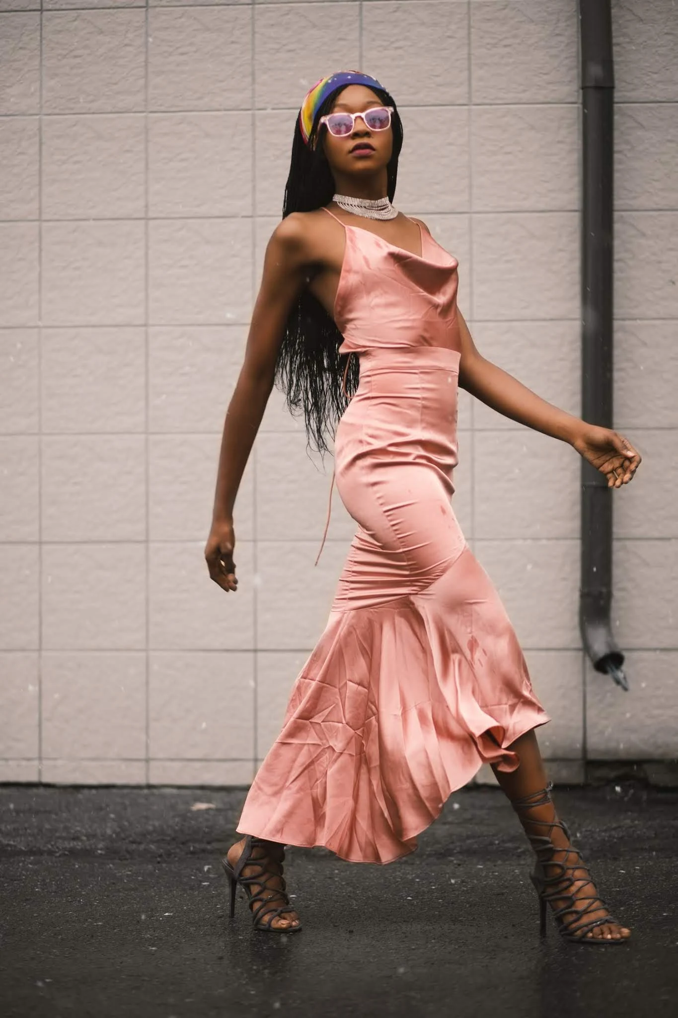 woman in soft pink midi dress made from silk