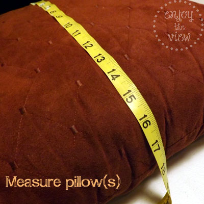 rust pillow with measuring tape