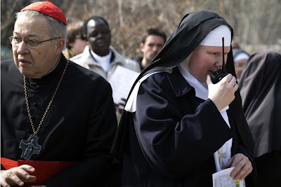 Nun uses walkie-talkie during Good Friday event