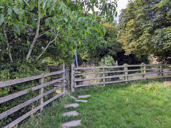 Go through the gate then turn right on Walnut Tree Road