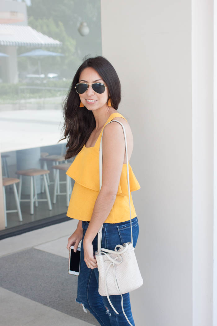 cute yellow tassel earrings and flowy top