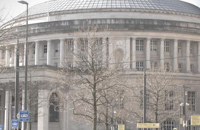 White round building with dome and columns