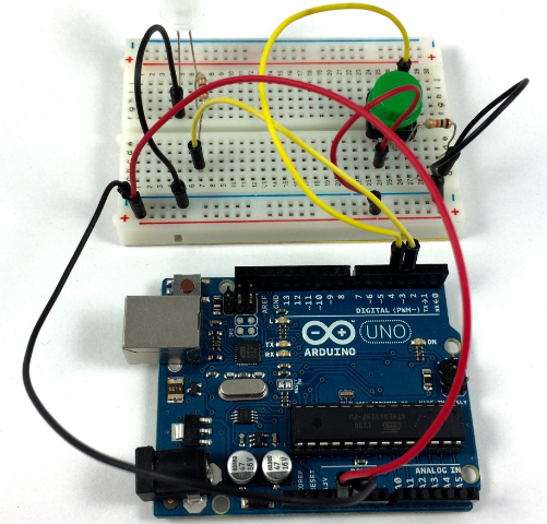 The Arduino and breadboarded LED and button