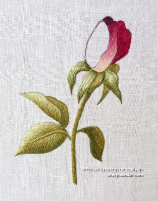 Embroidered rosebud in progress (needlepainting design by Trish Burr)