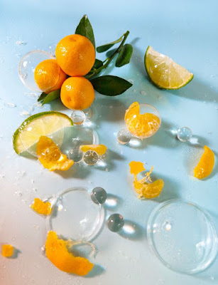 Source: OPPO. A composition by Lim featuring citrus fruit, clear glass and bubbles.