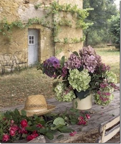 purple and green dired hydrangea outside french home via pinterest