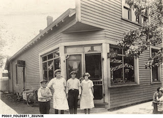 Some of my great-great aunts and uncles standing in front of my great-great grandfather's grocery store