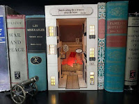 Manualidades decorativas en miniatura para bibliotecas fantásticas
