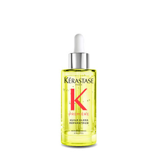 Image of Kérastase Huile Gloss Shine Repairing Hair Oil, a lightweight oil that adds shine and smoothness while controlling frizz and flyaways.