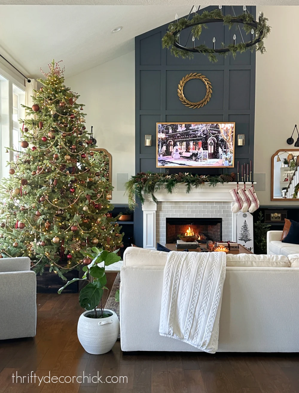 tall fireplace and tree layout living room