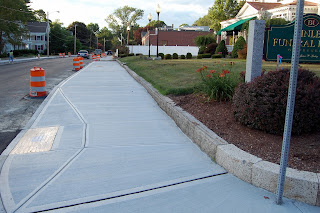 new sidewalk in front of the Ginley Funeral Home