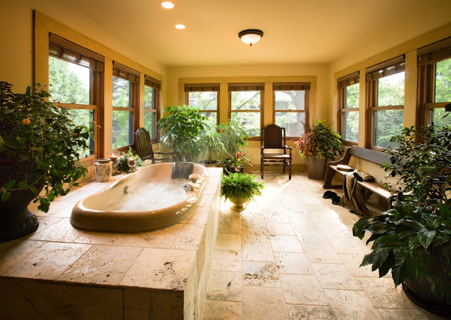 Large bathroom with lots of plants 