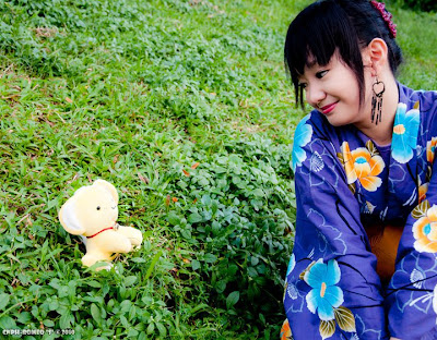 Cosplayer Cela as Sakura in Kimono with Kero