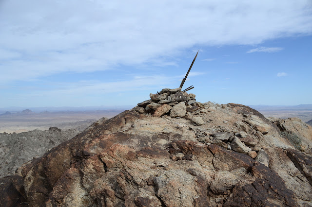 sticks placed at the high point