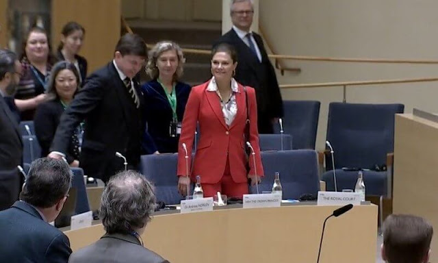 Crown Princess Victoria wore a Paris gold buttons single-breasted red blazer by The Extreme Collection. Extreme Collection trousers