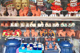 Various size and cloro shisa statues, pottery