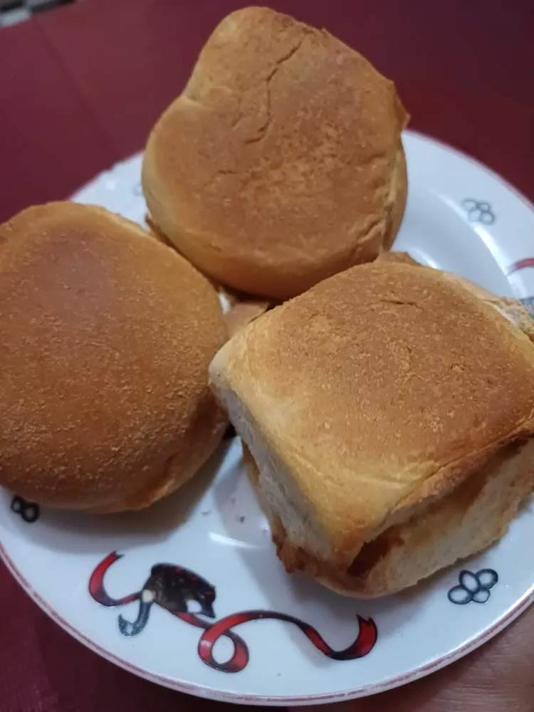 Toasted pandesal with kesong puti and strawberry jam