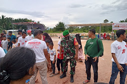 Babinsa Kelurahan Ranai Rota Bantu Mempersiapkan Permainan rakyat