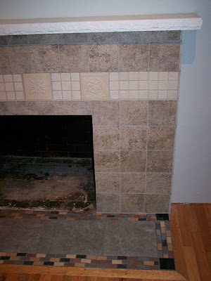 completed fireplace tiling