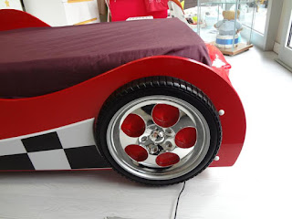 Coche cama en color rojo